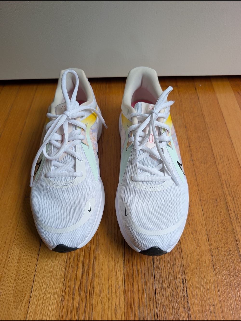 Nike Women's White Running Sneakers with Pastel Accents